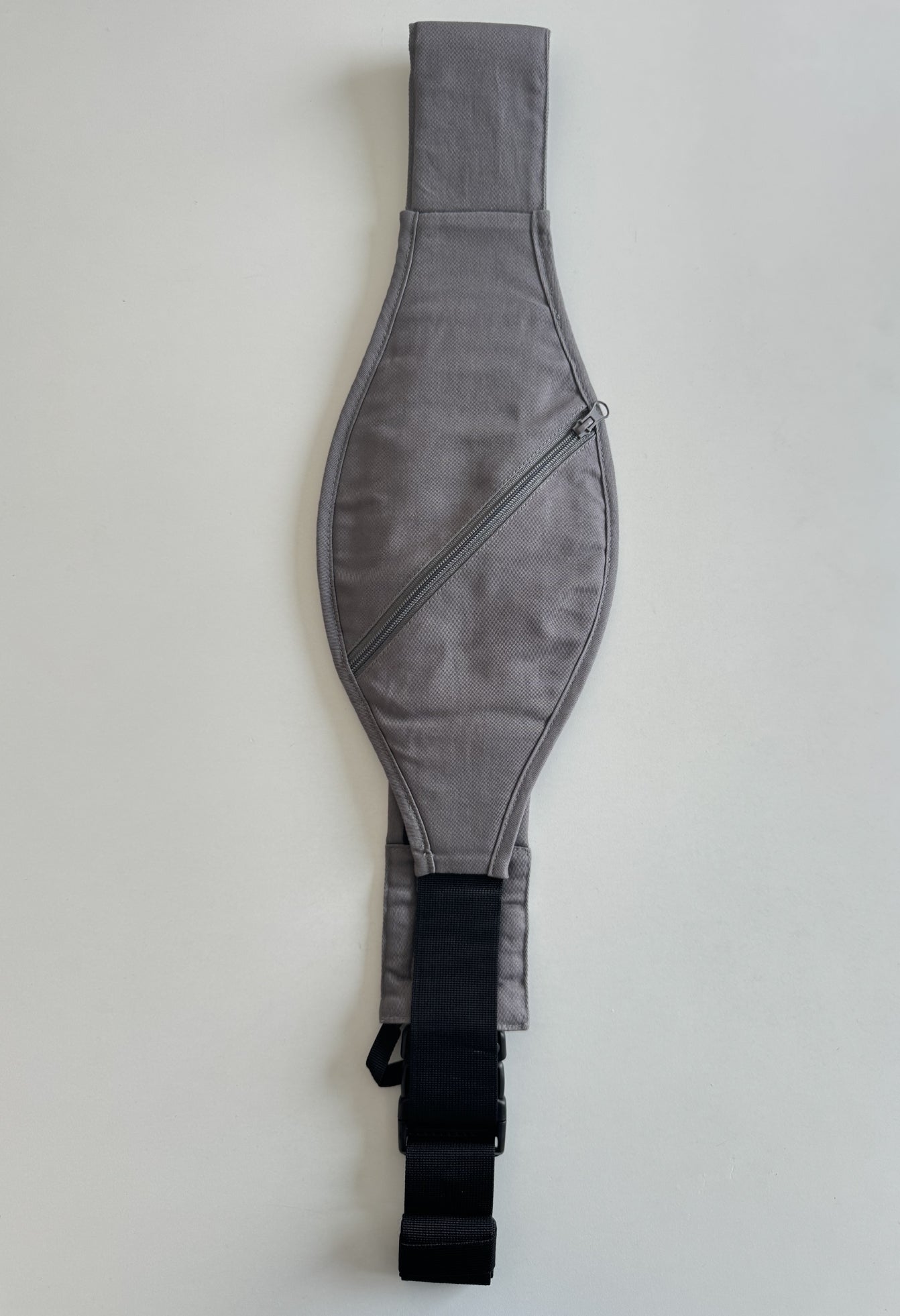 Front view of the Grey Stone Rouu Baby II hip carrier worn on the hip