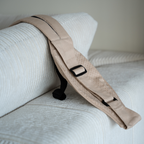 Rouu Baby II Sand Beige Extendable hip carrier with back strap, front view